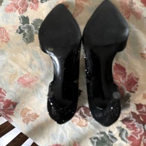 black and silver star studded pumps